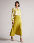AYVERI-Tops-A gorgeous baroque printed blouse, AYVERI is ideal for a warm summer evening, or a lunchtime coffee date. This top features a gathered yoke for added interest and will look stunning with jeans or shorts and an elegant strappy heel. Blouse Baroque print Gathered yoke detail Long sleeved Button fastening Cropped boxy fit Wendy is 5'9.5" / 1.77m and wears Yellow in a Ted size 1- Ted Baker Romania